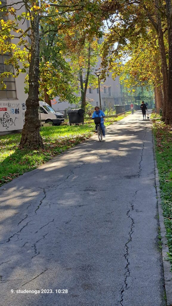 A woman-cyclist-on-the-pedestrian-path-in-Park-Klasije